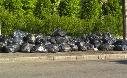 Waste clearance service vehicle in an urban area